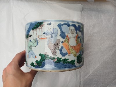 Lot 505 - A Chinese wucai 'Luohan' brush pot, 19th - 20th century