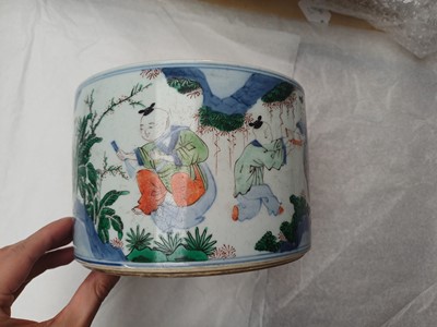 Lot 505 - A Chinese wucai 'Luohan' brush pot, 19th - 20th century