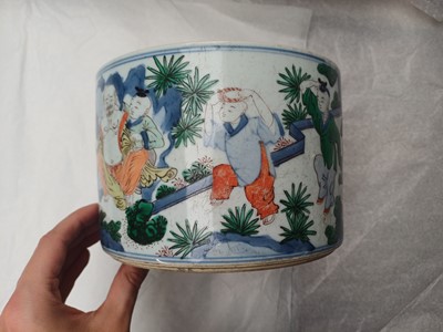 Lot 505 - A Chinese wucai 'Luohan' brush pot, 19th - 20th century