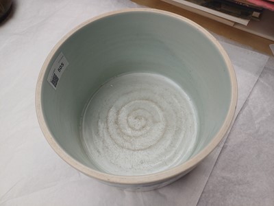 Lot 505 - A Chinese wucai 'Luohan' brush pot, 19th - 20th century