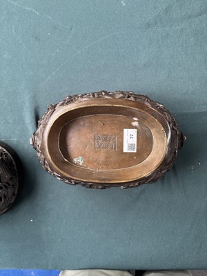 Lot 77 - A large Chinese bronze reticulated 'dragon and phoenix' censer, 17th century