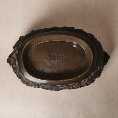 Lot 77 - A large Chinese bronze reticulated 'dragon and phoenix' censer, 17th century