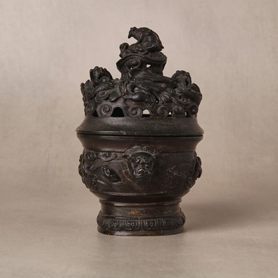 Lot 74 - A fine Chinese bronze parcel-gilt 'dragon and phoenix' censer and cover, 17th century