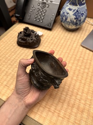 Lot 74 - A fine Chinese bronze parcel-gilt 'dragon and phoenix' censer and cover, 17th century