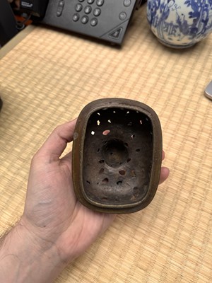 Lot 74 - A fine Chinese bronze parcel-gilt 'dragon and phoenix' censer and cover, 17th century