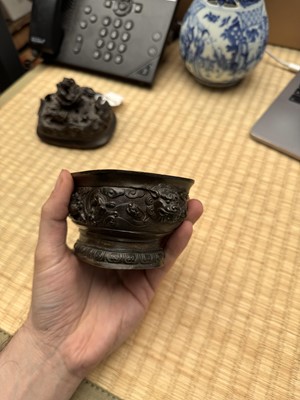 Lot 74 - A fine Chinese bronze parcel-gilt 'dragon and phoenix' censer and cover, 17th century