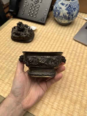 Lot 74 - A fine Chinese bronze parcel-gilt 'dragon and phoenix' censer and cover, 17th century