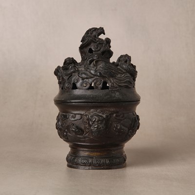 Lot 74 - A fine Chinese bronze parcel-gilt 'dragon and phoenix' censer and cover, 17th century