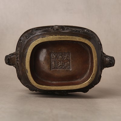 Lot 74 - A fine Chinese bronze parcel-gilt 'dragon and phoenix' censer and cover, 17th century