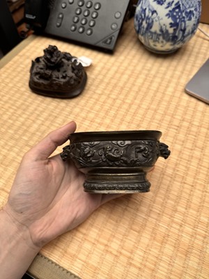 Lot 74 - A fine Chinese bronze parcel-gilt 'dragon and phoenix' censer and cover, 17th century