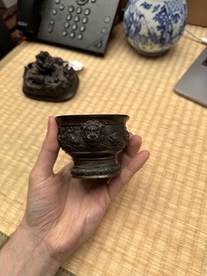 Lot 74 - A fine Chinese bronze parcel-gilt 'dragon and phoenix' censer and cover, 17th century