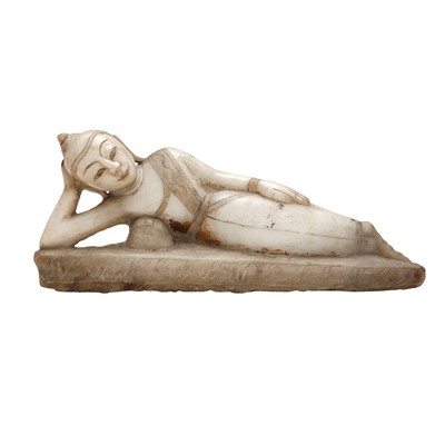 Lot 776 - A Burmese parcel-gilt marble figure of reclining Buddha, 19th century