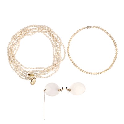 Lot 152 - Two necklaces and a pair of spectacles