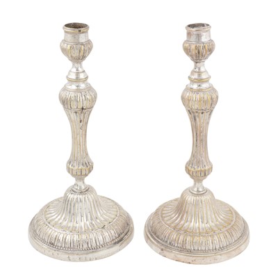 Lot 667 - A pair of early 19th century French silver plated candlesticks