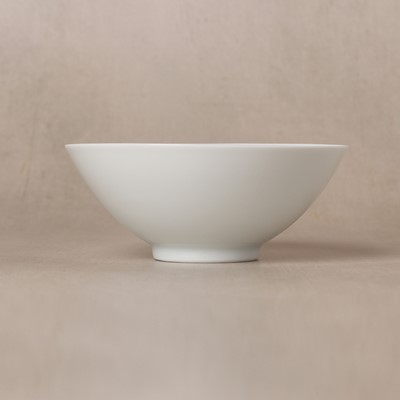 Lot 60 - A fine Chinese monochrome white-glazed bowl, Qing dynasty, Yongzheng mark and of the period