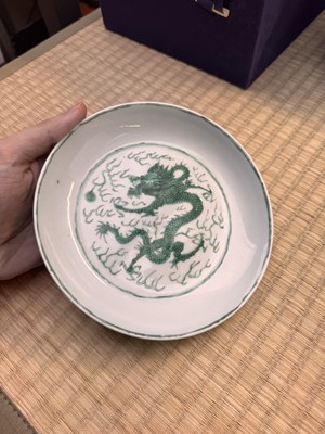 Lot 67 - A Chinese green-enamelled 'dragon' dish, Qing dynasty, Xianfeng mark and of the period