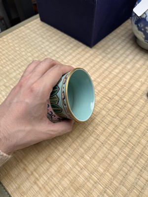 Lot 69 - A Chinese famille-rose 'lotus' leys jar, zhadou, Qing dynasty, 18th/19th century