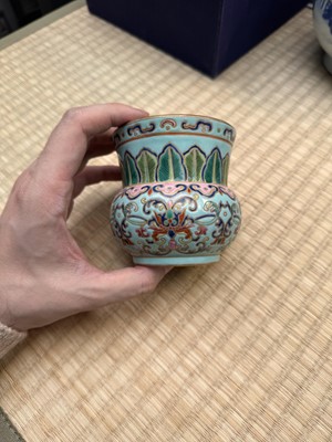 Lot 69 - A Chinese famille-rose 'lotus' leys jar, zhadou, Qing dynasty, 18th/19th century