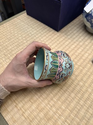 Lot 69 - A Chinese famille-rose 'lotus' leys jar, zhadou, Qing dynasty, 18th/19th century