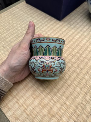 Lot 69 - A Chinese famille-rose 'lotus' leys jar, zhadou, Qing dynasty, 18th/19th century