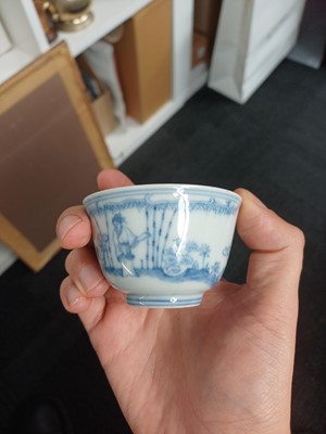 Lot 77 - A Chinese blue and white 'figural' cup, Qing Dynasty, 18th century