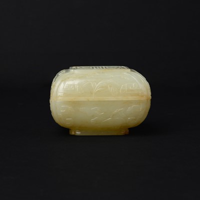 Lot 112 - A Chinese celadon jade 'lotus pond' box and cover, Qing dynasty, 18th/19th century