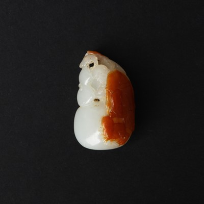 Lot 97 - A fine Chinese white and russet jade 'Liu Hai' pendant, Qing dynasty, 18th/20th century