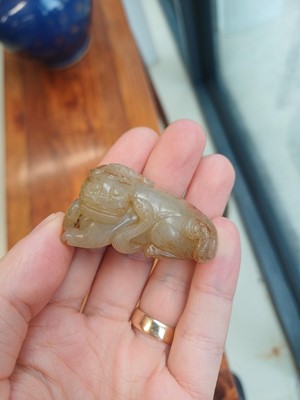 Lot 84 - A Chinese jade 'mythical beast' group, 19th / 20th century