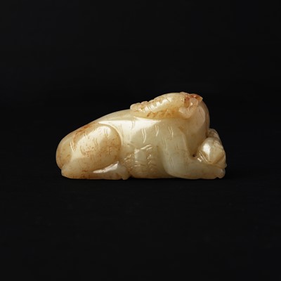 Lot 84 - A Chinese jade 'mythical beast' group, 19th / 20th century