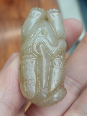 Lot 84 - A Chinese jade 'mythical beast' group, 19th / 20th century