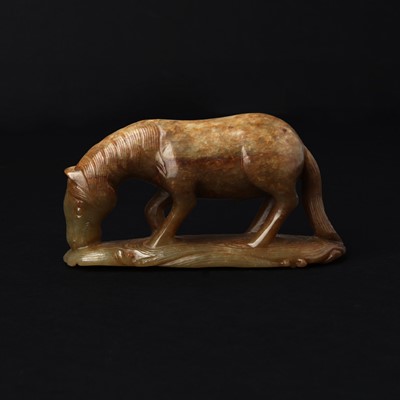 Lot 142 - A Chinese jade 'horse' group, 19th/20th century