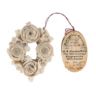 Lot 372 - A Champion's Bristol white biscuit porcelain floral brooch