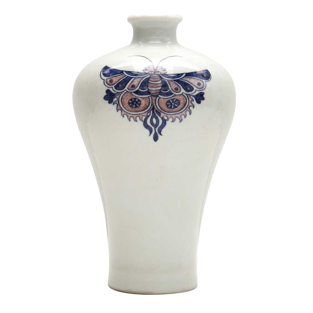 Lot 83 - A Chinese blue and white and copper-red 'butterfly' vase, 19th / 20th century