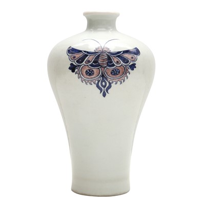 Lot 83 - A Chinese blue and white and copper-red 'butterfly' vase, 19th / 20th century