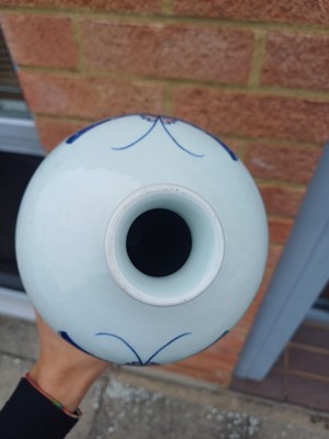 Lot 83 - A Chinese blue and white and copper-red 'butterfly' vase, 19th / 20th century