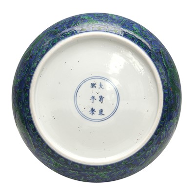 Lot 342 - A Chinese green-enamelled 'dragon' dish, late Qing dynasty, Kangxi mark