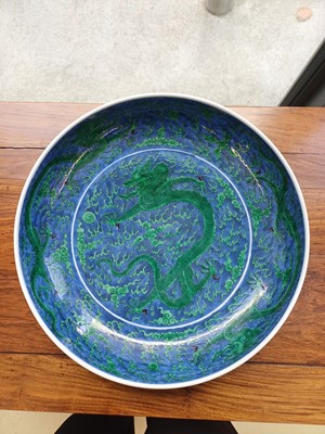 Lot 342 - A Chinese green-enamelled 'dragon' dish, late Qing dynasty, Kangxi mark