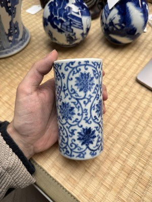 Lot 85 - A Chinese blue and white 'lotus scroll' brush pot, 20th century, Daoguang mark