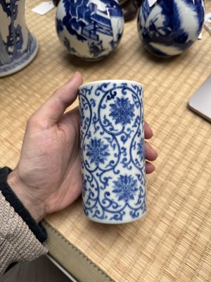 Lot 85 - A Chinese blue and white 'lotus scroll' brush pot, 20th century, Daoguang mark