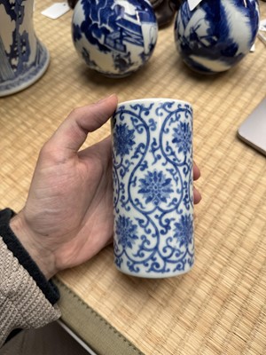 Lot 85 - A Chinese blue and white 'lotus scroll' brush pot, 20th century, Daoguang mark