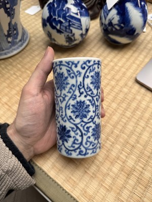 Lot 85 - A Chinese blue and white 'lotus scroll' brush pot, 20th century, Daoguang mark