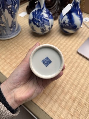 Lot 85 - A Chinese blue and white 'lotus scroll' brush pot, 20th century, Daoguang mark