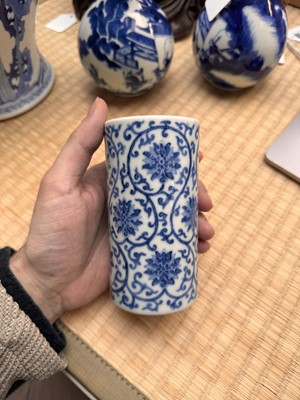 Lot 85 - A Chinese blue and white 'lotus scroll' brush pot, 20th century, Daoguang mark