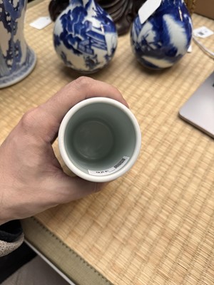 Lot 85 - A Chinese blue and white 'lotus scroll' brush pot, 20th century, Daoguang mark