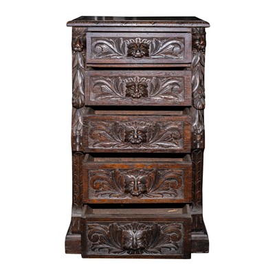 Lot 30 - A Victorian carved oak wellington chest, circa 1880-1900