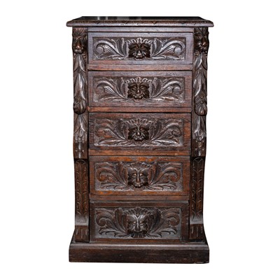 Lot 30 - A Victorian carved oak wellington chest, circa 1880-1900