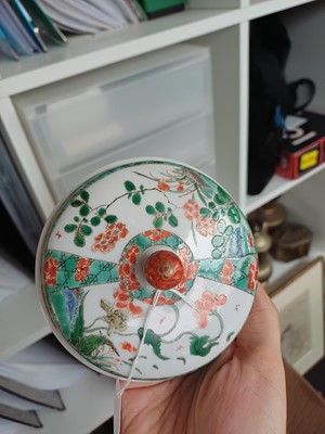 Lot 27 - A Chinese famille-verte double-handled 'floral' pot and cover, Qing dynasty, Kangxi period