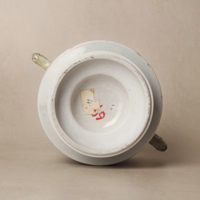 Lot 27 - A Chinese famille-verte double-handled 'floral' pot and cover, Qing dynasty, Kangxi period