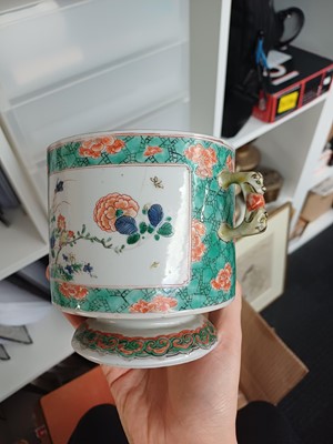 Lot 27 - A Chinese famille-verte double-handled 'floral' pot and cover, Qing dynasty, Kangxi period