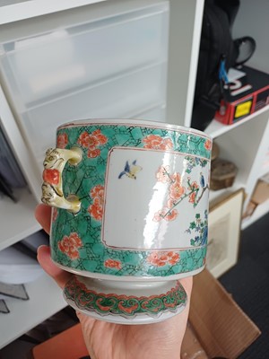 Lot 27 - A Chinese famille-verte double-handled 'floral' pot and cover, Qing dynasty, Kangxi period